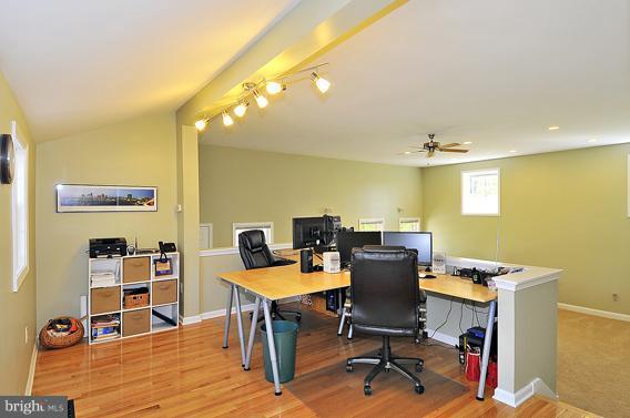 15310 Riding Stable Road Laurel, MD 20707 - Photo 2 of 27 a view of a workspace with furniture and a workspace