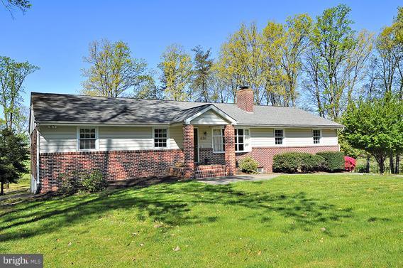 15310 Riding Stable Road Laurel, MD 20707 - Photo 11 of 27 front view of a house with a yard