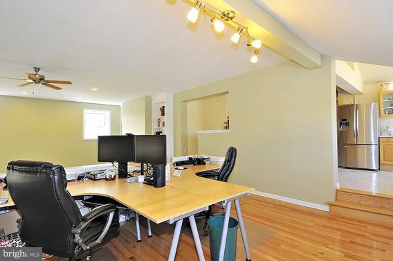 15310 Riding Stable Road Laurel, MD 20707 - Photo 16 of 27 a view of a dining room with furniture and wooden floor