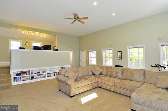 15310 Riding Stable Road Laurel, MD 20707 - Photo 24 of 27 a living room with furniture and kitchen view