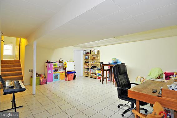 15310 Riding Stable Road Laurel, MD 20707 - Photo 5 of 27 a view of a room with gym equipment