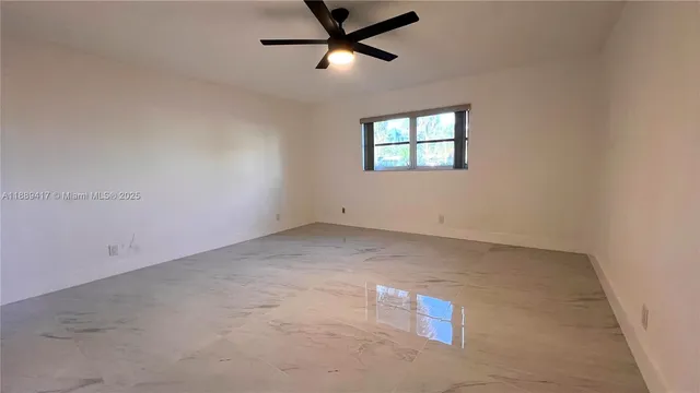 a view of a bathroom with a glass door