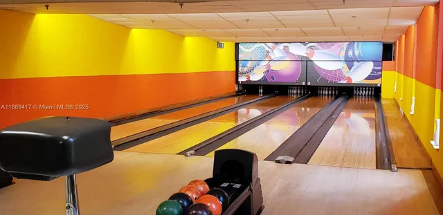 a view of living room that has a book shelf
