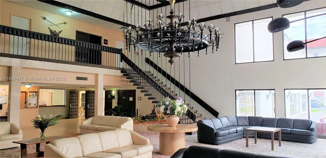 a front view of a house with yard and green space