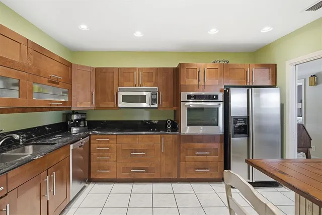 a room with a table and chairs