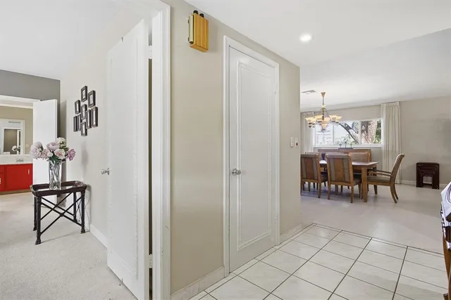 a room with a bed and furniture