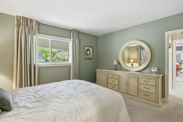 a view of a house with a tree