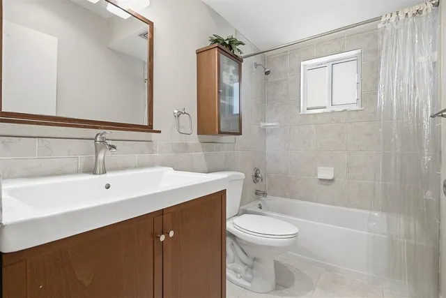 a view of a pathway with a yard