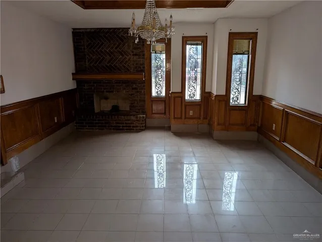 a view of an entryway with a fireplace