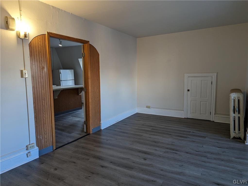 168 West Main Street, Unit 3F Kutztown, PA 19530 - Photo 6 of 12 a view of a hallway view with wooden floor and staircase