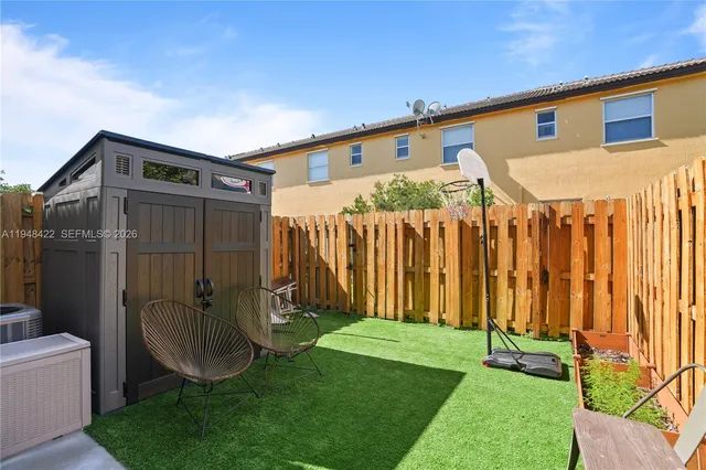 a front view of a house having yard