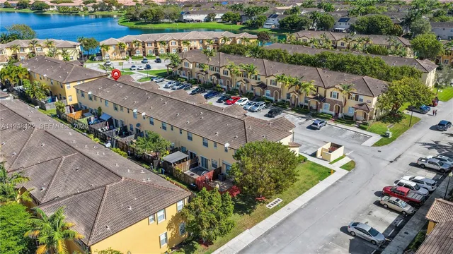 an aerial view of a city and mountain view in back