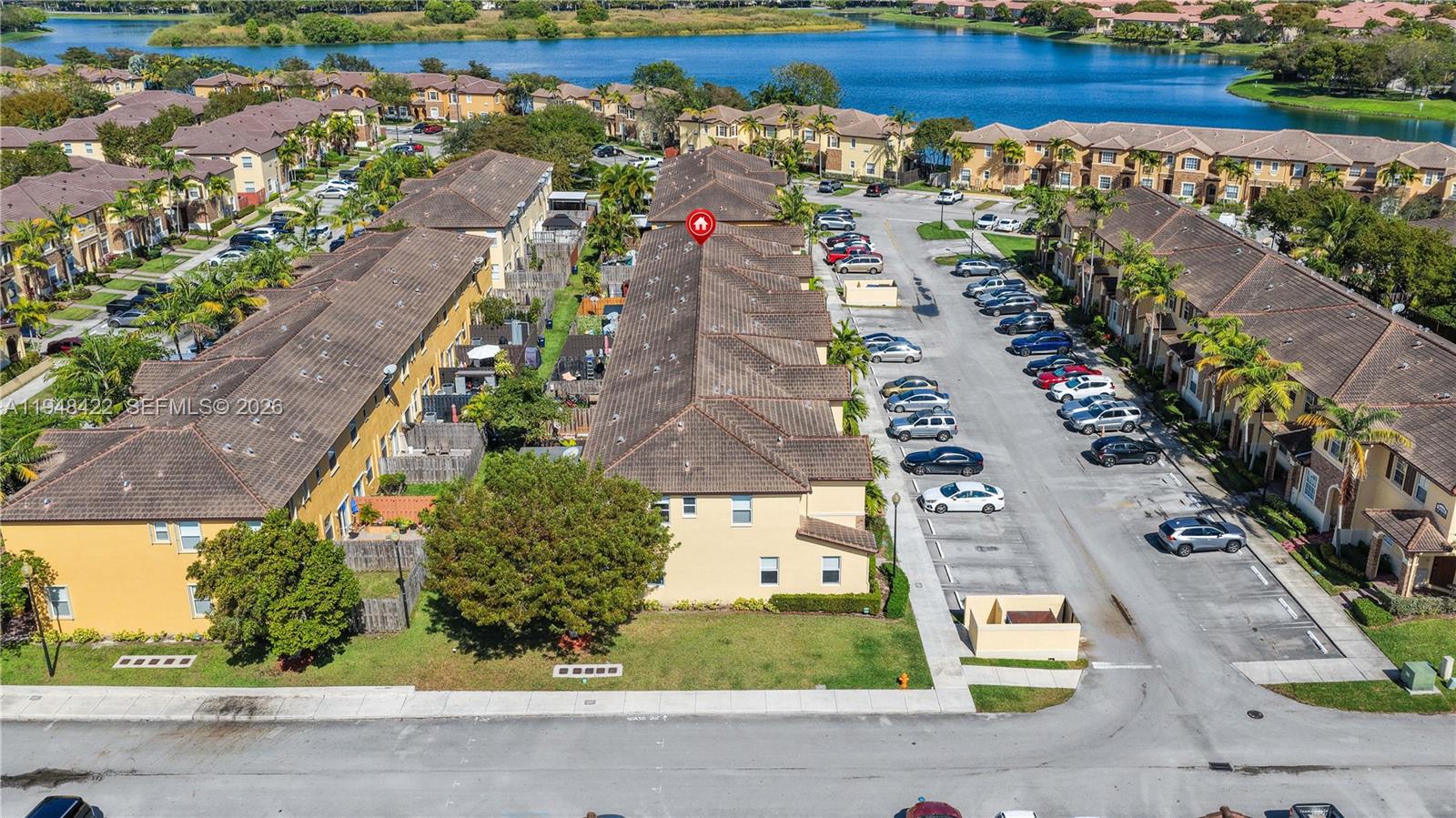 9105 Southwest 227th Street, Unit 9 Cutler Bay, FL 33190 - Photo 31 of 37 an aerial view of a city