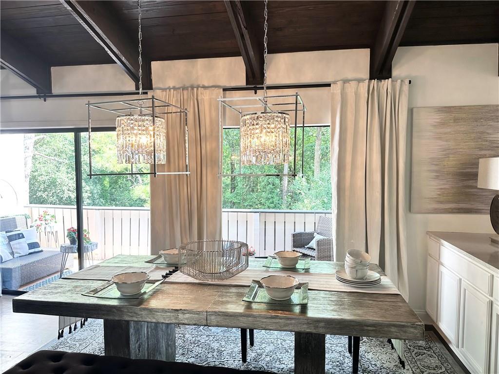 3823 Paces Ferry West Atlanta, GA 30339 - Photo 1 of 33 a view of a dining room with furniture window and outside view