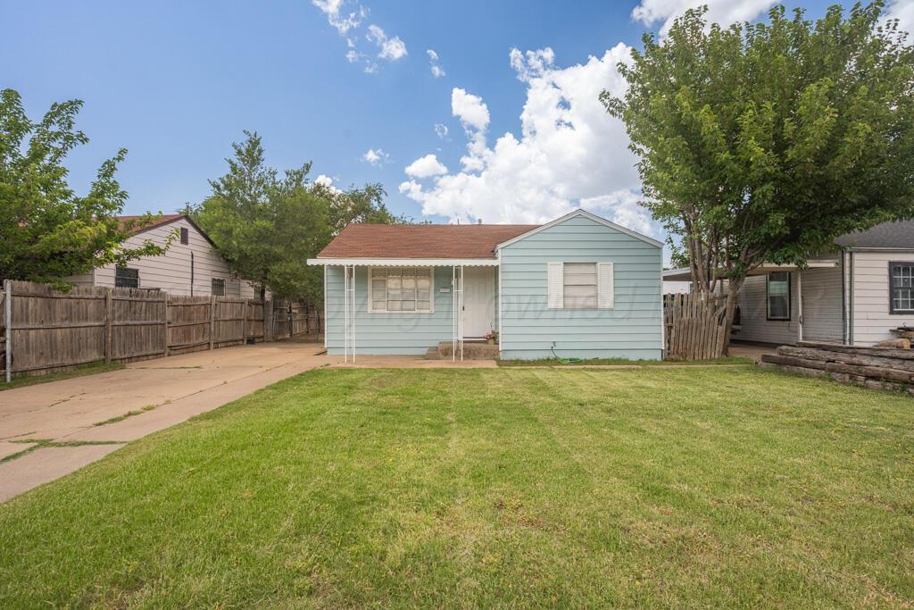 a house view with a garden space