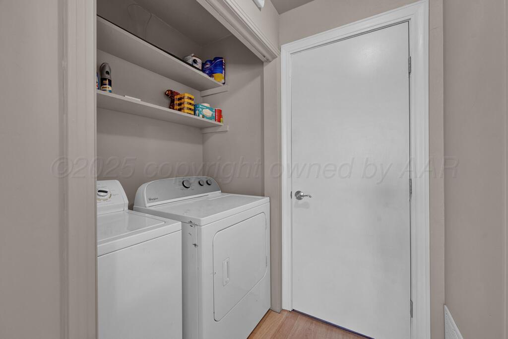 312 Southwest 45th Avenue Amarillo, TX 79110 - Photo 20 of 23 a utility room with dryer and washer