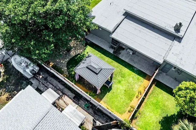 a view of a two chairs in the balcony