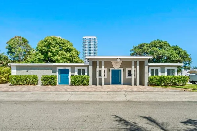 front view of a house with a street