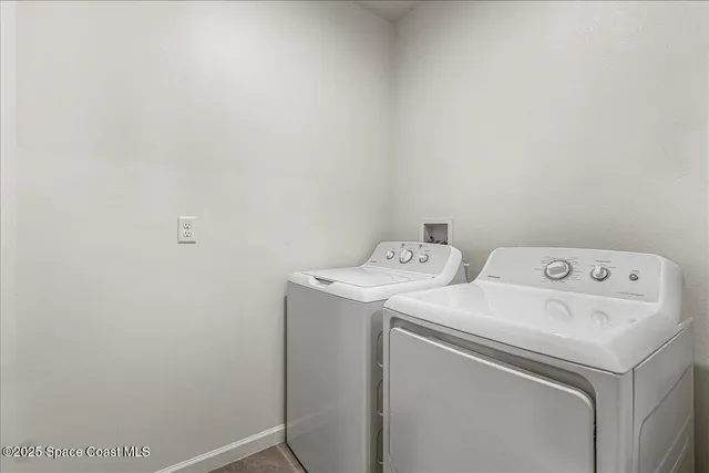 a room with furniture and a large window