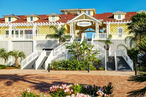 a view of a balcony with an ocean