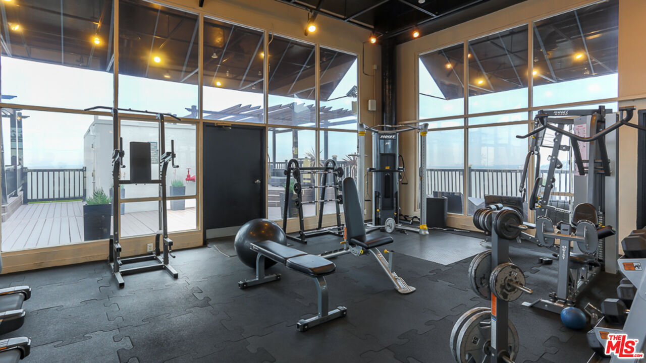 7250 Franklin Avenue, Unit 1112 Los Angeles, CA 90046 - Photo 24 of 29 a view of a room with gym equipment