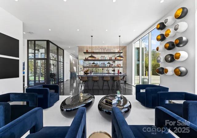 a room with furniture and a large window