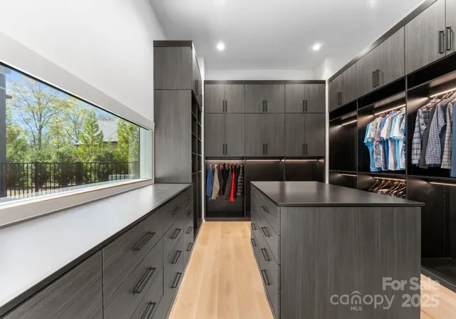 a living room with a couch and a large window