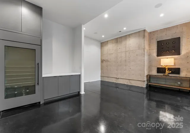 a view of a balcony with furniture and shower