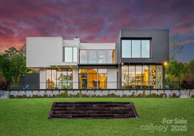 a view of a house with a back yard