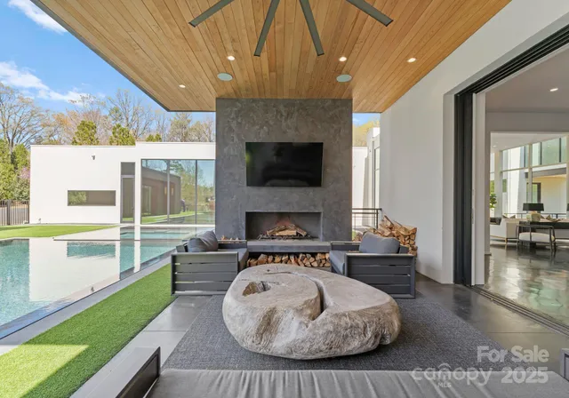 a view of a living room and a fireplace