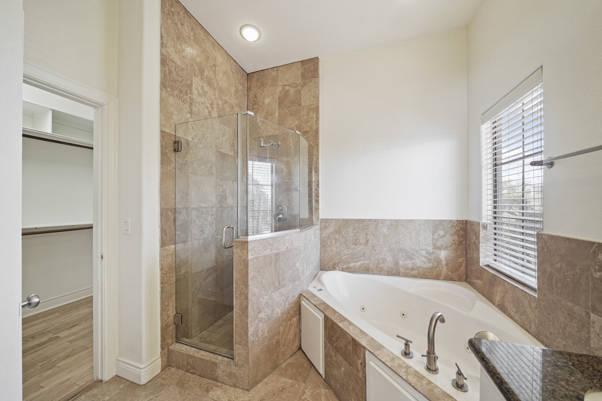 1402 Wheeler Avenue Houston, TX 77004 - Photo 24 of 40 a bathroom with a tub shower and sink