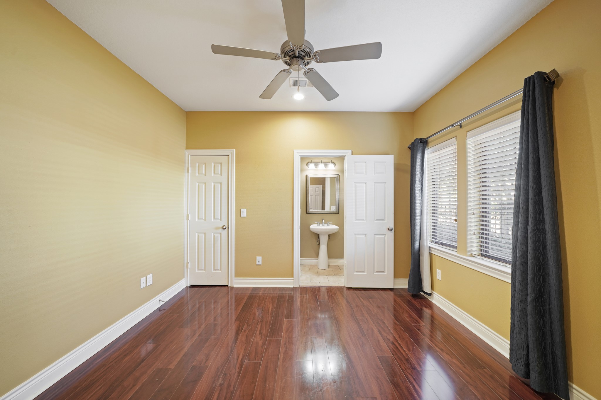 1402 Wheeler Avenue Houston, TX 77004 - Photo 33 of 40 wooden floor in an empty room with a window