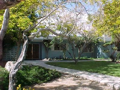 18373 Cocopah Road Apple Valley, CA 92307 - Photo 1 of 1 a front view of a house with garden