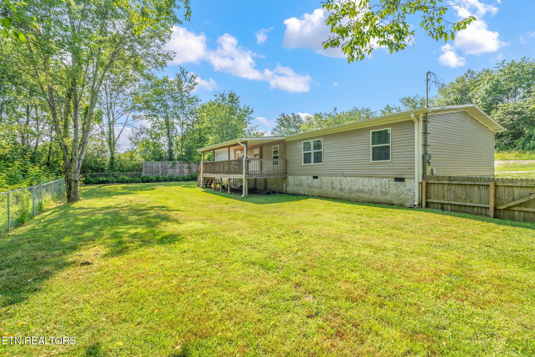 20156 Steekee Road Loudon, TN 37774 - Photo 31 of 46 a view of a house with a backyard