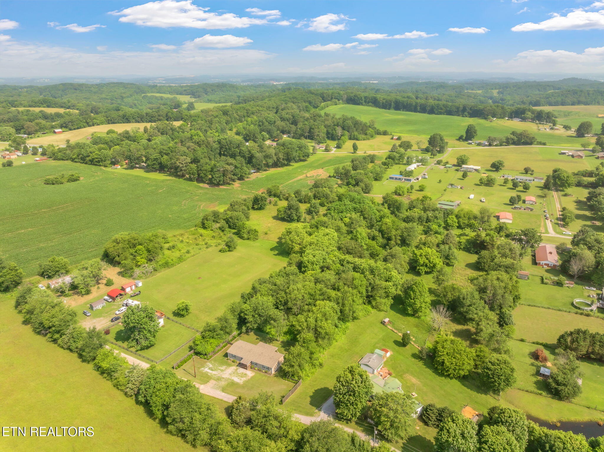 20156 Steekee Road Loudon, TN 37774 - Photo 38 of 46 a view of a lake with a houses