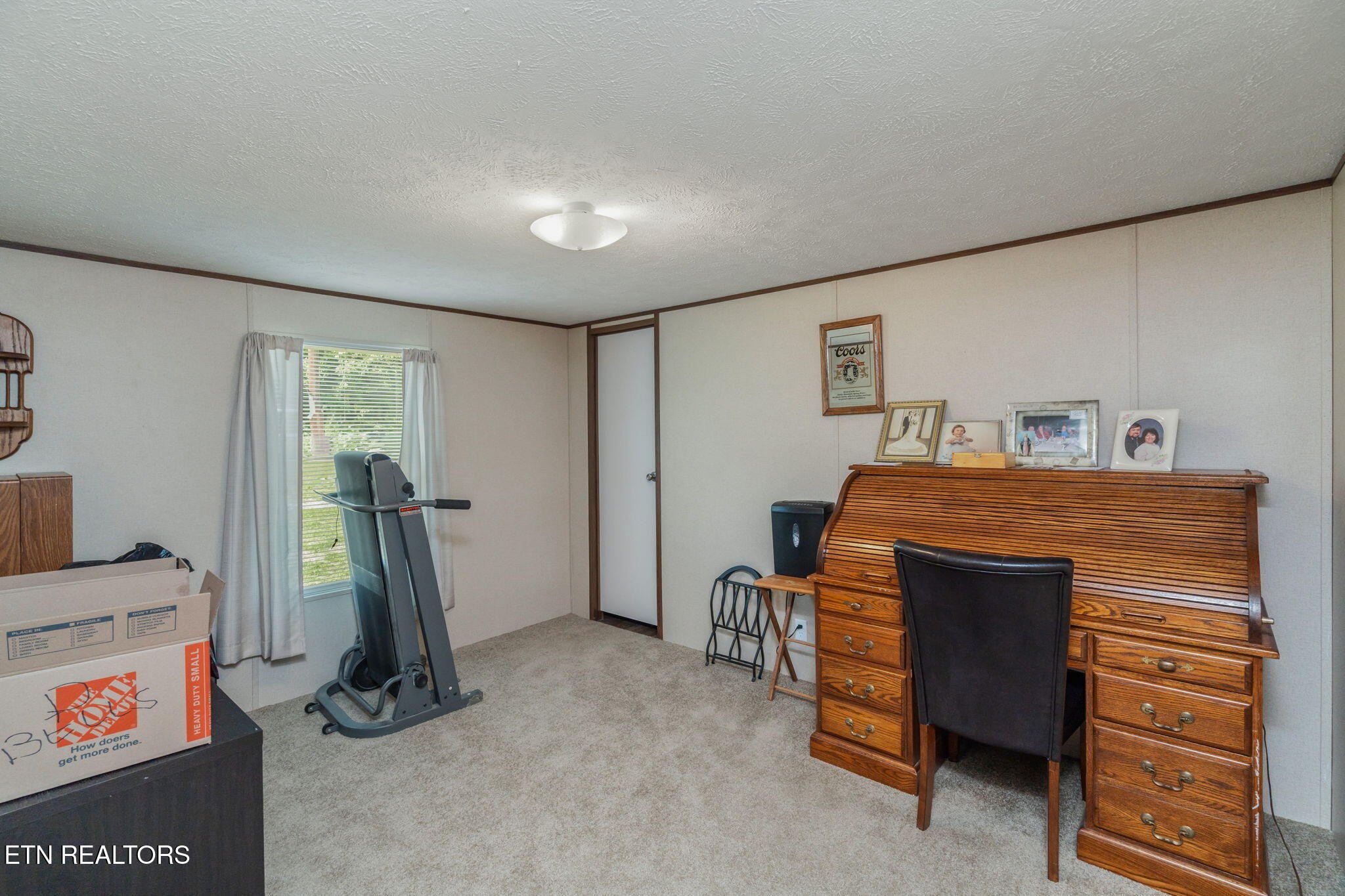 20156 Steekee Road Loudon, TN 37774 - Photo 6 of 46 a room with furniture and a flat screen tv