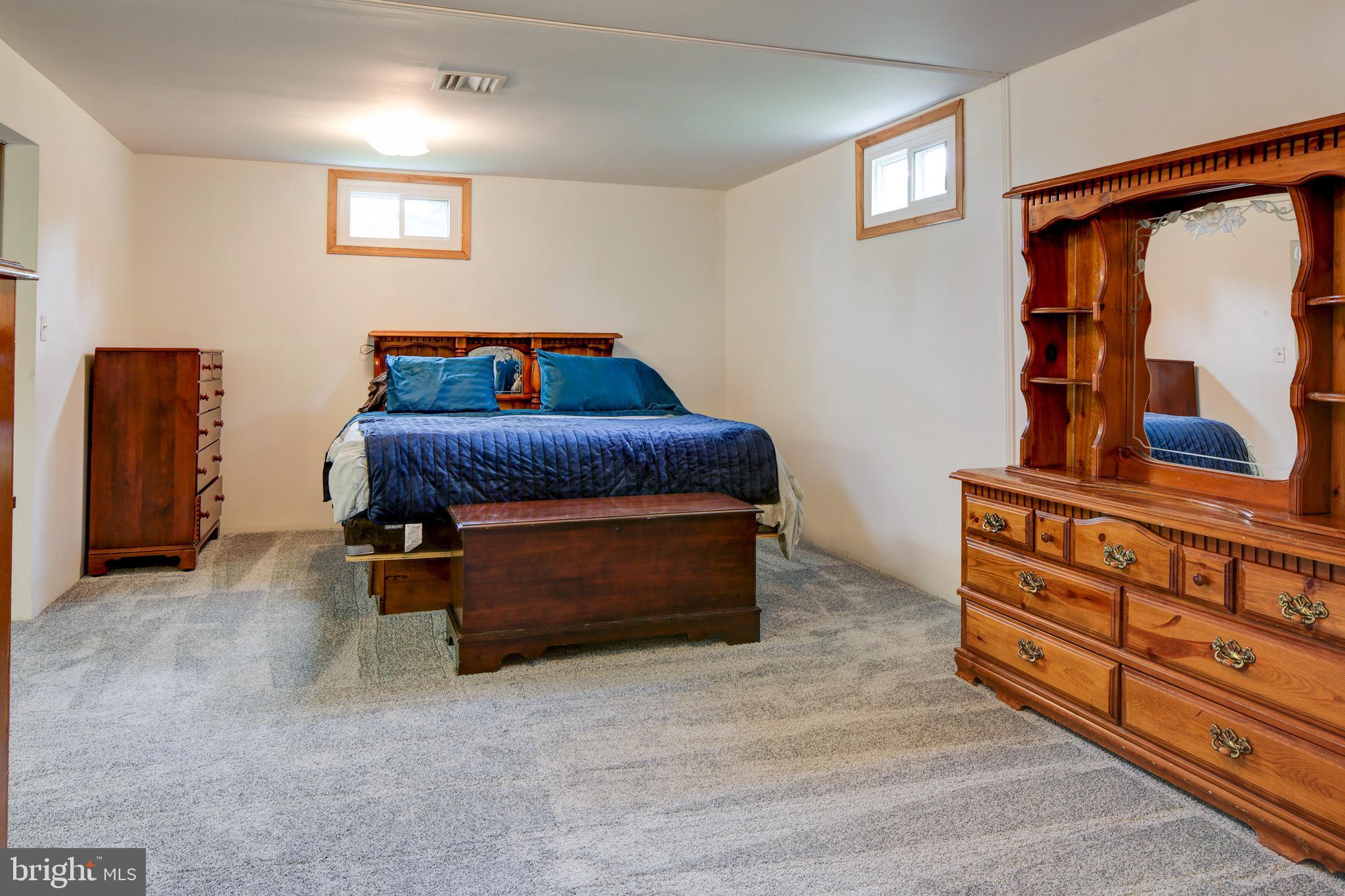 1543 Governor Bridge Road Davidsonville, MD 21035 - Photo 24 of 42 Spacious lower level family room (no legal egress)