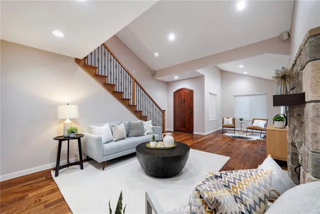 a bathroom with a sink toilet a mirror and shower