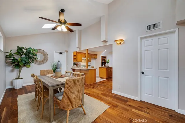 a kitchen with granite countertop a sink and cabinets