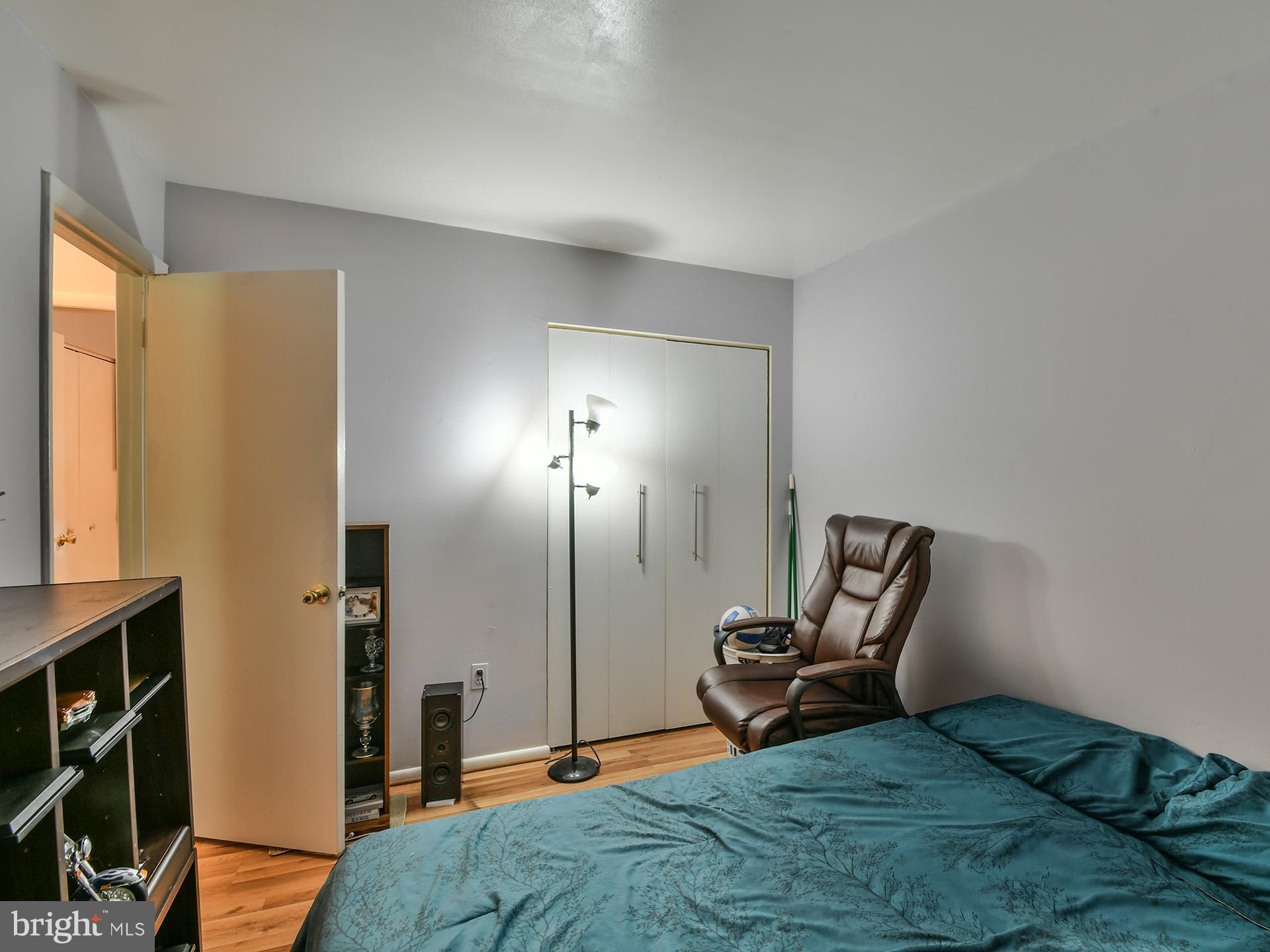8600 Sumter Lane Clinton, MD 20735 - Photo 23 of 51 a bedroom with a bed and a chair