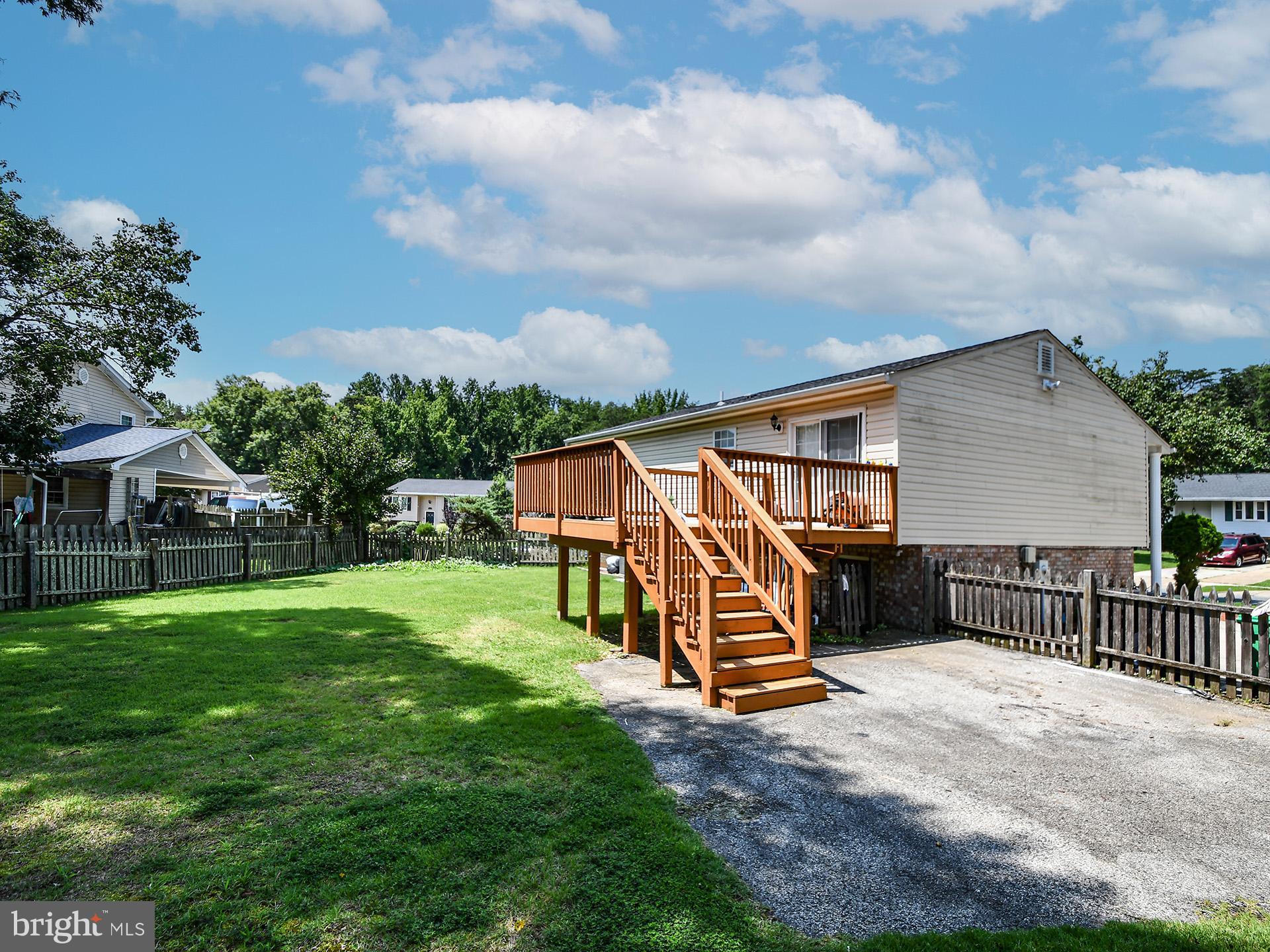 8600 Sumter Lane Clinton, MD 20735 - Photo 5 of 51 a view of a house with a yard and furniture