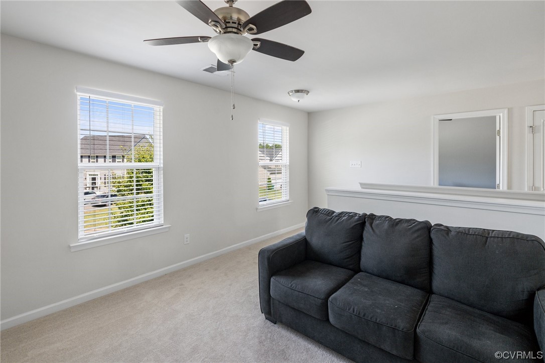 5419 Sandy Ridge Terrace Chesterfield, VA 23832 - Photo 15 of 27 a living room with furniture and a window