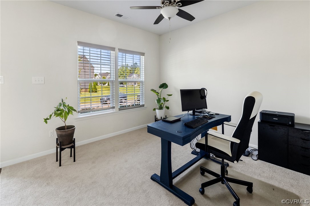 5419 Sandy Ridge Terrace Chesterfield, VA 23832 - Photo 2 of 27 a view of a workspace with furniture and a window