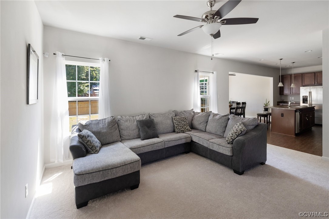 5419 Sandy Ridge Terrace Chesterfield, VA 23832 - Photo 3 of 27 a living room with furniture and a window