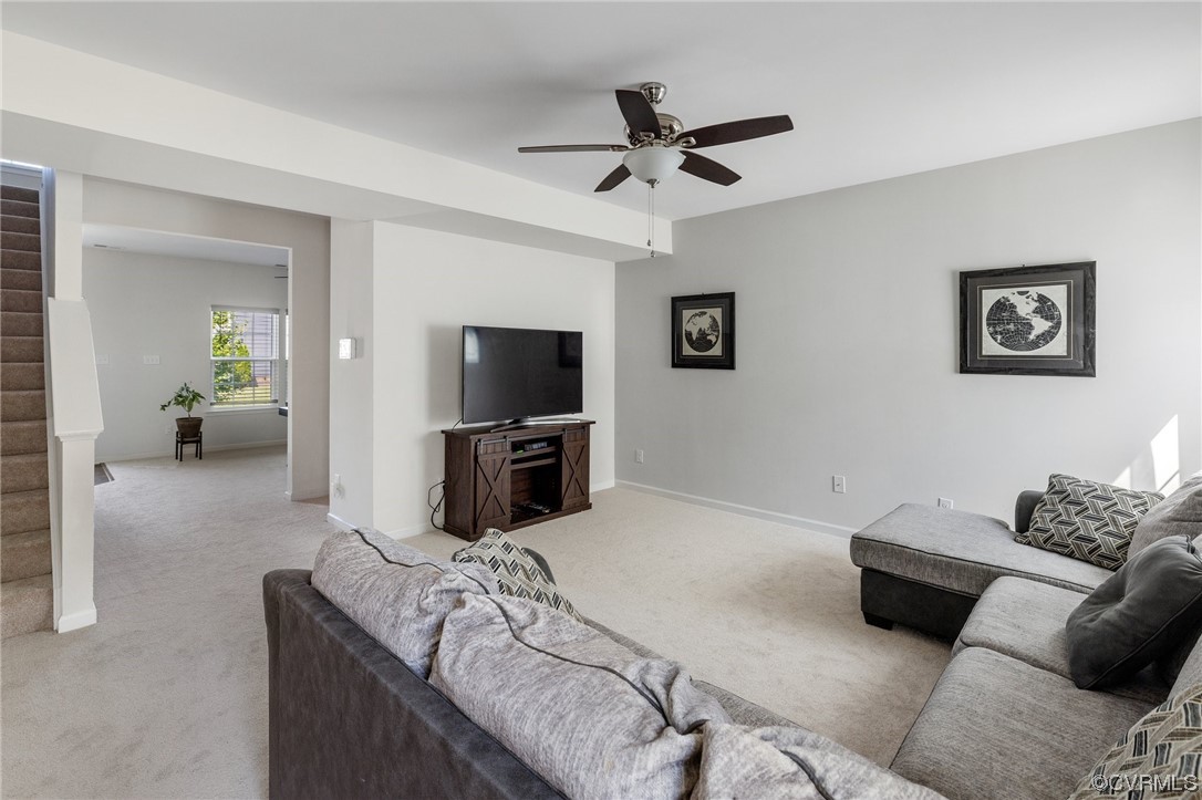5419 Sandy Ridge Terrace Chesterfield, VA 23832 - Photo 5 of 27 a living room with furniture and a flat screen tv