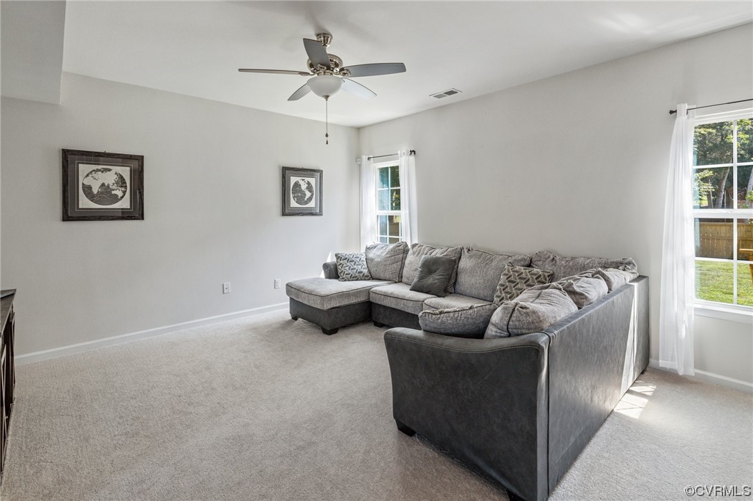 5419 Sandy Ridge Terrace Chesterfield, VA 23832 - Photo 6 of 27 a living room with furniture and window
