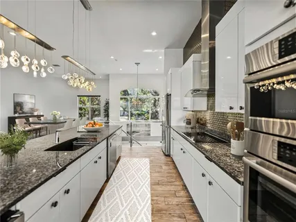 a bathroom with a toilet and a mirror