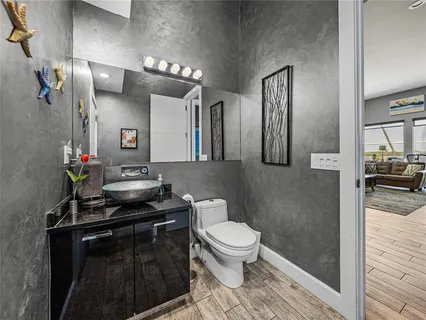 a white bath tub sitting in a bathroom