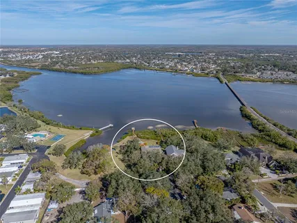 a view of a chairs and table in the patio