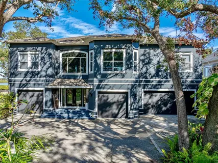 a view of entryway and hallway with wooden floor